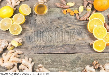 Ingredients For Ginger Shot Recipe. Immunity Boosting Components For Ginger Drink. On The Old Wooden