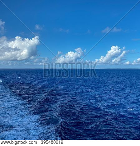 The Holland America Line Zuiderdam Cruise Ship Sailing Away From The Private Island Of Half Moon Cay