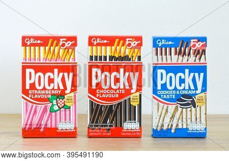 Phuket, Thailand -  November 12, 2020 : Packaging Box Of Glico Brand Pocky Biscuit Sticks Strawberry
