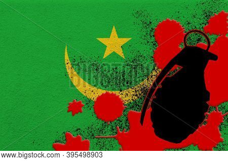 Mauritania Flag And Mk2 Frag Grenade In Red Blood. Concept For Terror Attack Or Military Operations 