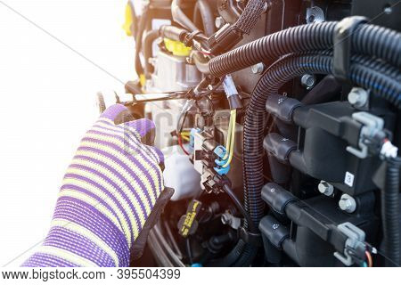 Repairing  Outboard Marine Engine. Motorboat Engine Seasonal Service And Maintenance. Mechanic Yfnd