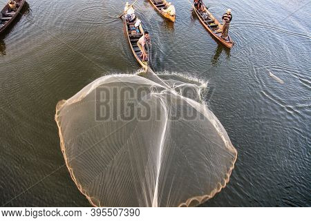 Mandalay, Myanmar - Nov 12, 2019: Fishermen Near U Bein Bridge In Amarapura,mandalay Myanmar