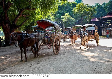 Mandalay, Myanmar - Nov 12, 2019: Horse Buggy At The Ruins Of The Ancient Kingdom Of Ava Amarapura I