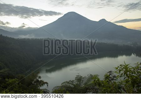 The Beauty Of Menjer Lake Against The Background Of Mount Sindoro. Tourist Destination \'hill Of Lov