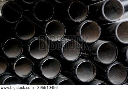 Black Metal Pipes And Adapters Of Different Diameters For Gasification Or Water Supply. Industrial B