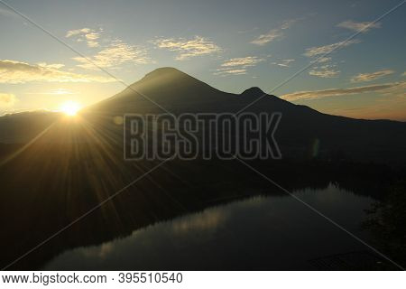 The Beauty Of Menjer Lake Against The Background Of Mount Sindoro. Tourist Destination \'hill Of Lov