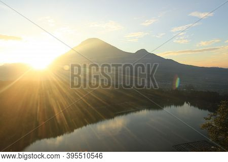 The Beauty Of Menjer Lake Against The Background Of Mount Sindoro. Tourist Destination \'hill Of Lov