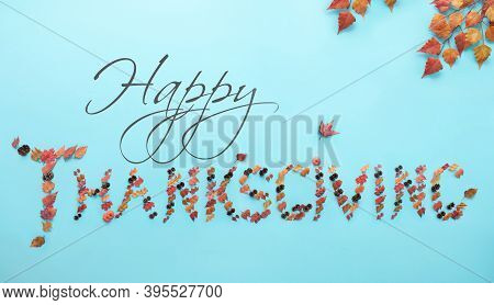 Thanskgiving Greeting Created With Autumnal Leaves, Pumpkin And Pine Cones