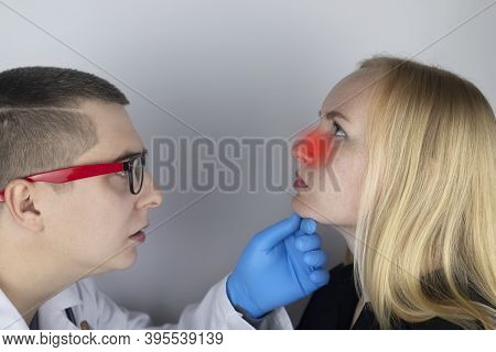 A Young Woman Touches Her Nose, Which Is Very Painful. Medical Care Concept For Difficulty Breathing