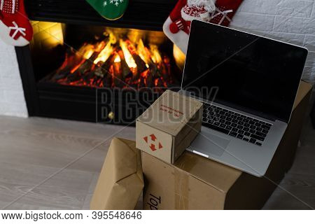 Kyiv, Ukraine - November 16, 2020: Boxes Nova Poshta With Delivery Of Christmas Gifts Lie Near The F
