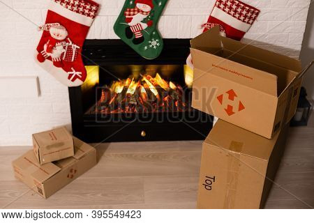Kyiv, Ukraine - November 16, 2020: Boxes Nova Poshta With Delivery Of Christmas Gifts Lie Near The F