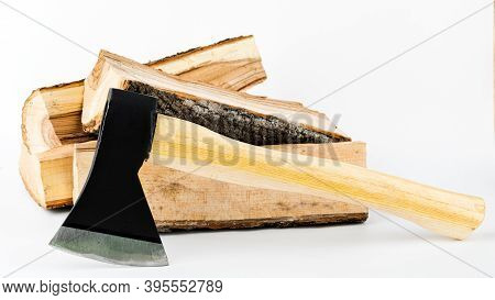 Firewood And An Axe On A White Isolated Background. Renewable Energy Resource. Ecological Concept.