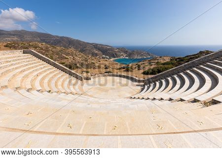 View Of The Odyseas Elytis, Amphitheater. Open Ancient Greek Style Theater With View The Sea. Ios Is