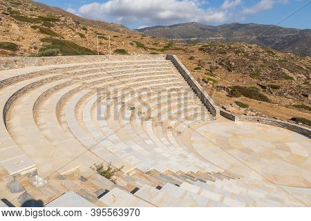 View Of The Odyseas Elytis, Amphitheater. Open Ancient Greek Style Theater With View The Sea. Ios Is