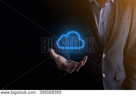 Businessman Hand Holding Cloud Computing Concept In Palm. Backup Storage Data Internet, Networking A