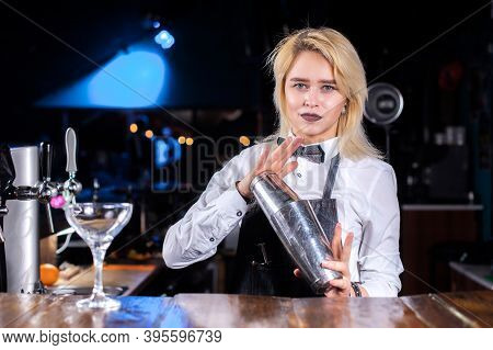 Girl Barman Creates A Cocktail At The Beerhall