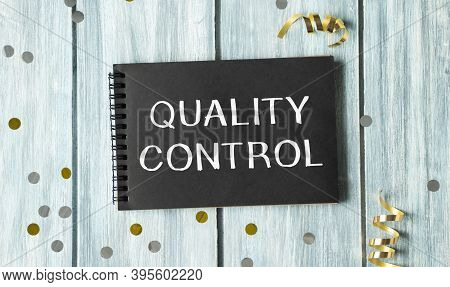 Text Showing Quality Control On Black Notepad. Business Concept For Improvement Work Written On Stic