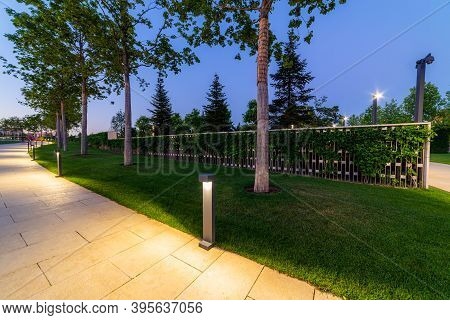 Maple Alley In French Garden In Public Landscape City Park Krasnodar Or Galitsky Park . Wooden Circu