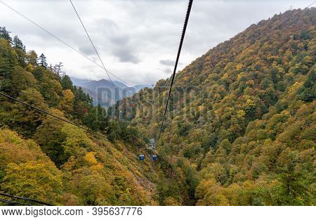 View Of Mountains And Valleys From The Dragondola (naeba-tashiro Gondola) In Autumn Foliage Season. 