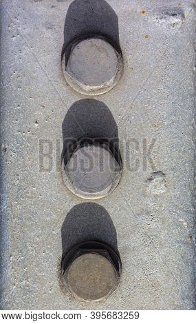 Large Head Bolts On Metal Construction As Background - Engineering Concept. Metal Heads Of Two Bolts
