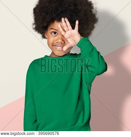 Black boy wearing green sweater psd mockup