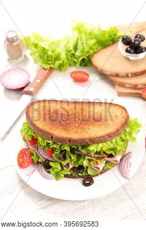 sandwich with lettuce, hma and cheese