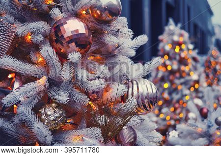 Golden Balls And Bubble On White Christmas Trees As An Element Of Decoration Of City Streets For The