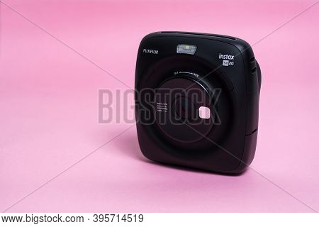 Kyiv, Ukraine - 14 July 2020: Fujifilm Instax Sq 20 Black On Apink Background.