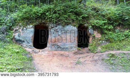 Anfabrika Rocks And Cellars In Ligatne Town An Old Floodgate Dam. Ancient Sandstone Caves And Ancien