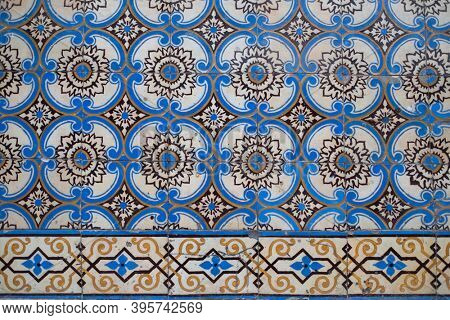 Old tiles wall on the street Portuguese painted tin-glazed, azulejos ceramic tilework. Porto, Portugal.