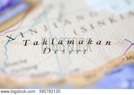 Shallow Depth Of Field Focus On Geographical Map Location Of Taklamakan Desert China Asia Continent 