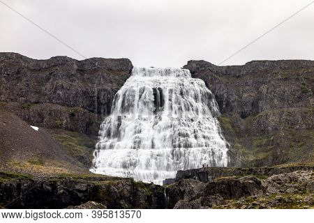 Frontal View Of Majestic Dynjandi (fjallfoss) Waterfall In Iceland During Cloudy Weather