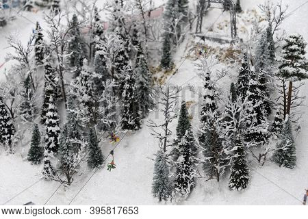 Miniature Of Realistic Ski Slope. Winter And Skiing.