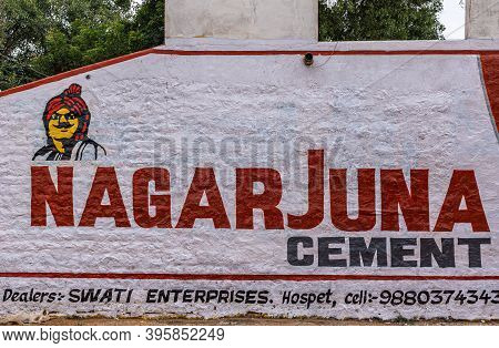 Kaddirampura,, Karnataka, India - November 4, 2013: Red And Black On White Wall Painted Advertisemen