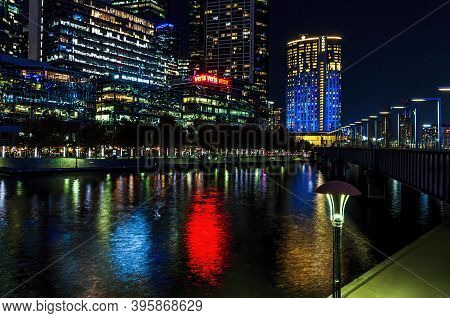 Melbourne, Australia - May 17, 2019: Night View Of The Melbourne Skyline Along The Yarra River On Fl