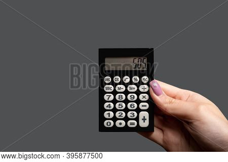 Financial Account. Statement Analysis. Invoice Index. Economic Management. Female Hand Holding Calcu