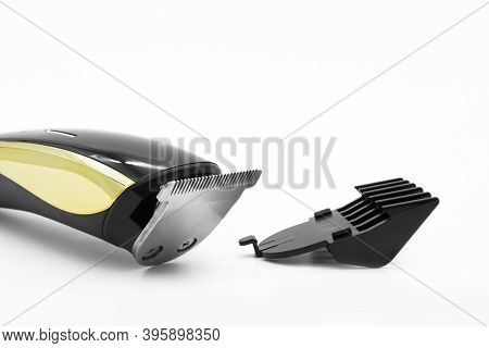 Close-up View Of The Cordless Electric Hair Clipper Isolated On The White Background.