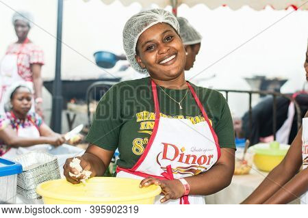 Abidjan, Ivory Coast, September 11, 2016: Smiling Young Woman Using The Atti