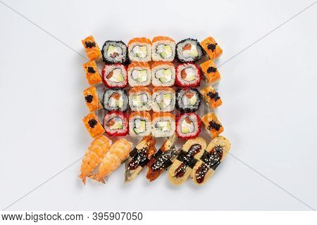 Large Set Of Different Types Of Sushi Maki And Nigiri On A Neutral Light Background