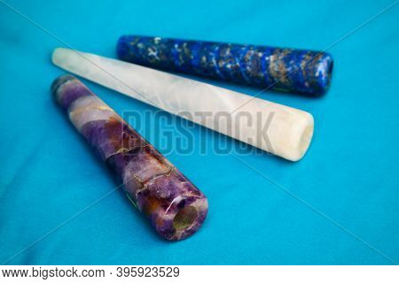 Clay Chillum For Marijuana Smoking On A Blue Fabric Background