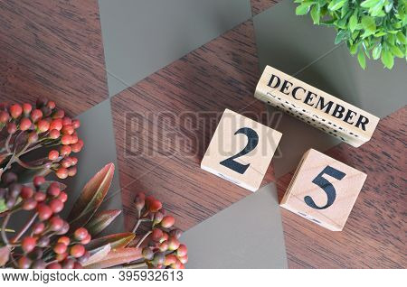 December 25. Date Of December Month. Diamond Wood Table For Background.