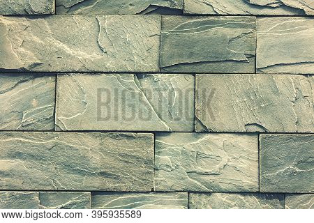 Stacked Stone Wall, Natural Stone Cladding. Stone Wall For Background, Slab Stone Wall Texture. Wall