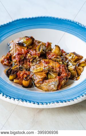 Bonito Fish Pieces With Tomato Sauce And Leek In Plate Baked In Oven / Fish Casserole.