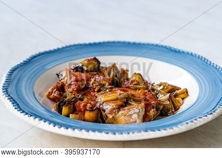 Bonito Fish Pieces With Tomato Sauce And Leek In Plate Baked In Oven / Fish Casserole.