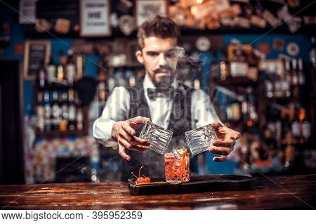 Barman Mixes A Cocktail In The Beerhall
