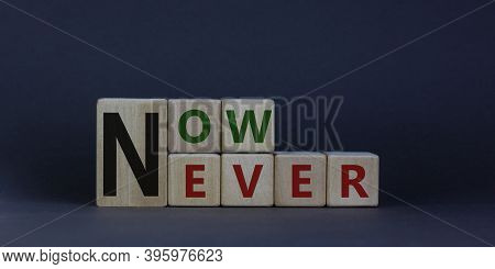 Now Or Never. Wooden Cubes With Words 'never' And 'now'. Beautiful Grey Background, Copy Space. Busi