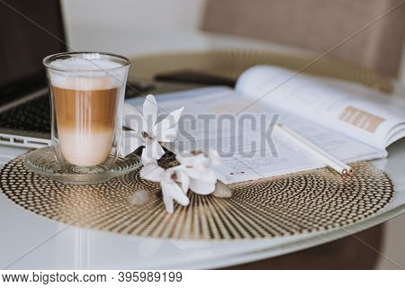 Notepad, Laptop And Coffee Cup On Wood Table. View From Above