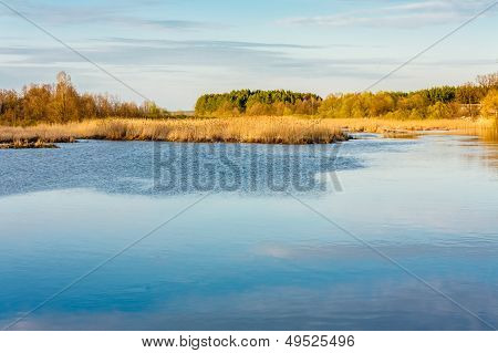 Sky And Clouds Reflection On Lake