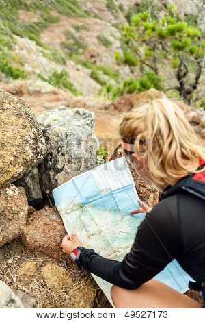 Trail Runner Checking Map
