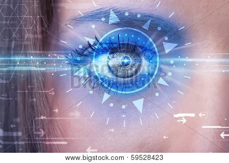 Modern cyber girl with technolgy eye looking into blue iris